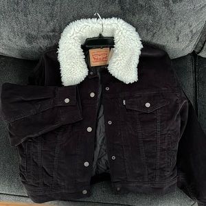 Levi’s black jacket, new, never been worn. Size small.